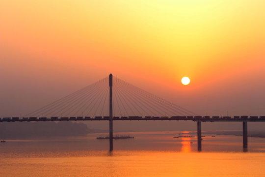 this is beautiful picture of sunrise at naini bridge,Allahabad.uttar pradesh,india.