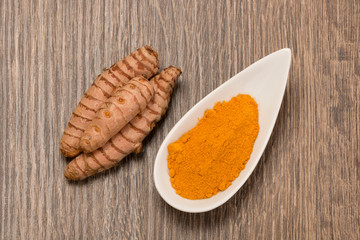 Raw and ground turmeric,