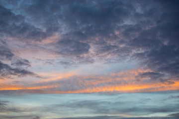 Sky and cloud at sunset with dark and vibrant light at  dusk