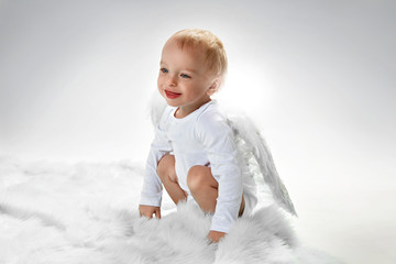 Portrait of a cute little baby angel
