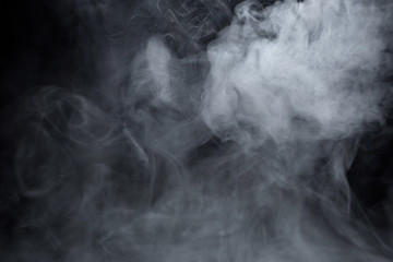 Texture of cigarette white smoke on a black background