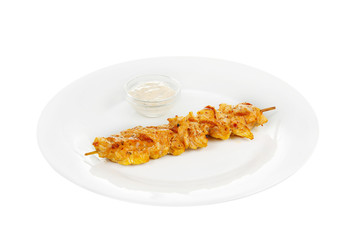 Shish kebab, pork, chicken grilled meat, barbecue, without side dish on a plate, isolated on white background. Mayonnaise, tar tar sauce. Side view For the menu