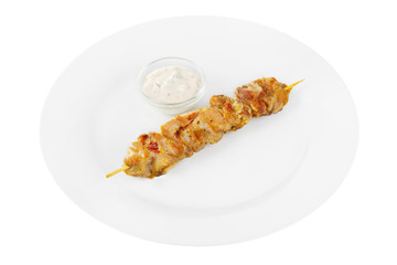 Shish kebab, beef, lamb, pork, chicken grilled meat, barbecue, without side dish on a plate, isolated on white background. Mayonnaise, tar tar sauce. Side view For the menu