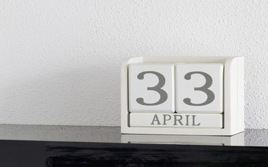 White block calendar present date 33 and month April - Extra day