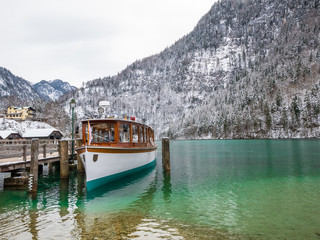 Fototapeta na wymiar landscape blue green lake moutain Passenger boat on the Koenigssee near Berchtesgaden, Bavaria, Germany