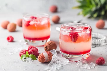 Tuinposter Cold lychee and raspberry cocktail © petrrgoskov