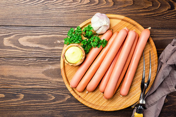 Raw frankfurter sausages