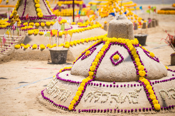 Thai people come to build the Sand Pagoda for return the sand to the temple on Songran festival at Ratchaburana temple in Phitsanulok Thailand.