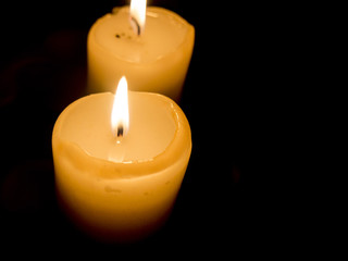two lighted candles