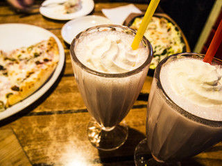 strawberry milkshake in a large glass