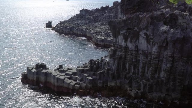 Daepo Jusangjeolli at Jungmun in Jeju, Korea. Jusangjeolli is a cliff made of basaltic columnar jointings at Jisatgae coast and one of the most famous attractions in Jeju.