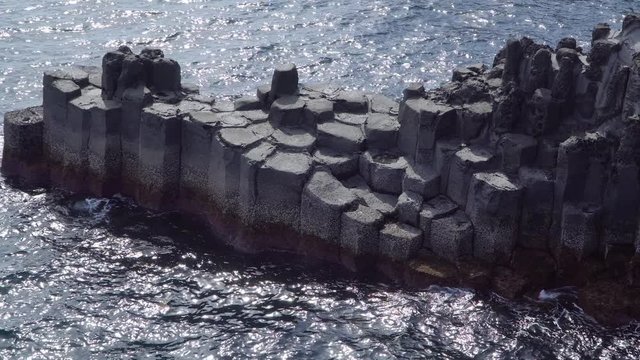 Daepo Jusangjeolli at Jungmun in Jeju, Korea. Jusangjeolli is a cliff made of basaltic columnar jointings at Jisatgae coast and one of the most famous attractions in Jeju.