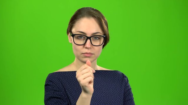Teacher in the class chooses who will answer. Green screen