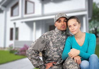 Smiling soldier with his wife