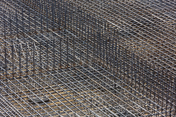 Fragment of the frame from the reinforcement, for pouring the formwork of the future building.