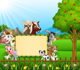 Farm animals with a blank sign board