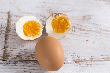 Eggson the white wood background