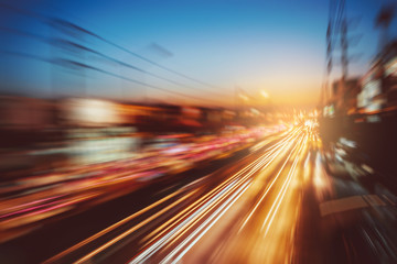 defocused or blured Long exposure on street motorway with trails of light, retro styles.