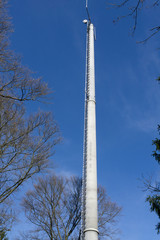 Transmitter mast in front of a blue sky