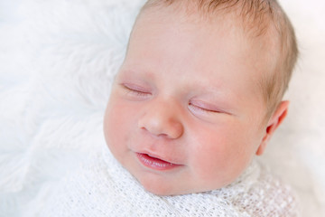 Close-up portrait of newborn baby