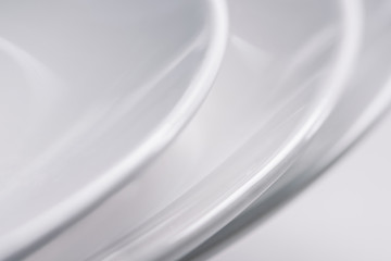 Close-up view of white ceramic plates