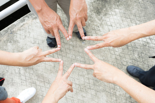 Diverse group of fingers as a star together, Conceptual photo of teamwork