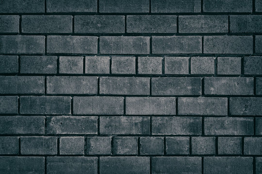 Dark grey brick wall for background