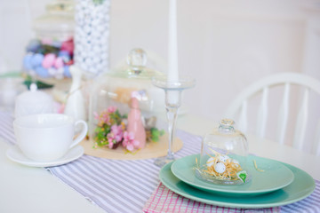 kitchen dining room with flowers and white furniture