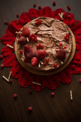 Chocolate cream cake with berries