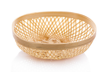 Basket wicker on isolated white background.