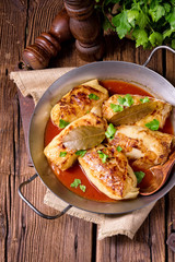 baked cabbage rolls in tomato sauce