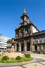 Facade of the Church of the Holy Trinity. The Church of the Trinity is a church in the city of Oporto in Portugal, located in the square of the Trinity behind the building of the Oporto City Hall.