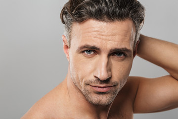 Obraz premium Handsome mature man. Looking camera.