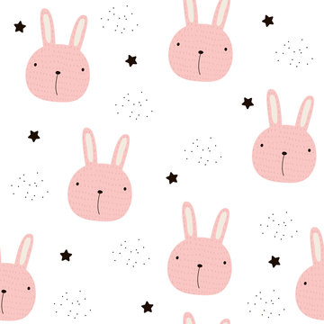 Kids seamless pattern with pink bunny. Vector hand drawn illustration.