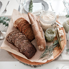 Sliced bread and sauces on the table