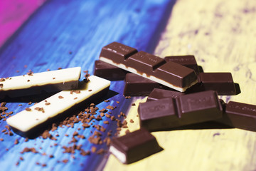 Chocolate bar close up on colorful background