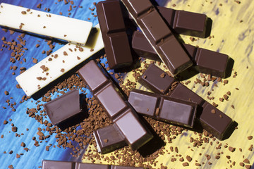 Chocolate bar close up on colorful background