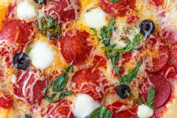 Pizza pepperoni Pattern Background. Fresh baked Pepperoni Pizza with mozzarella cheese, Basil leaf  and tomato sauce..
