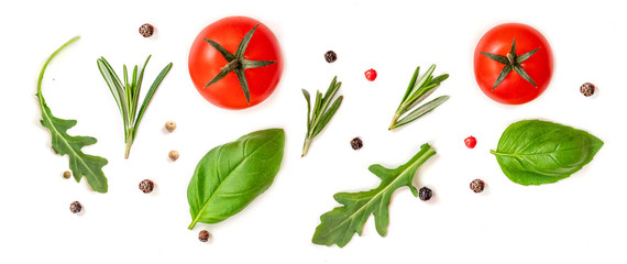 Tomato, rosemary and basil leaf  isolated on white background, top view. Creative layout with fresh organic vegetables and spices. Flat lay. Food concept..