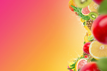 Tropical fruits with water splash on colorful background, empty space