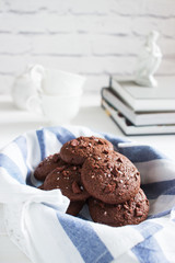 Chocolate cookies sea salt white wooden background.