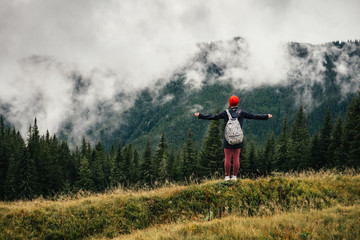 Female hiker feeling free enjoys the Carpathian nature