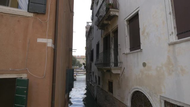 Narrow canal between old buildings