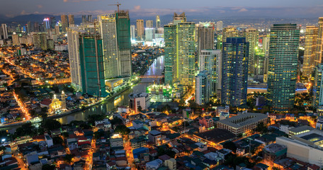 Manila Skyline. Night view of Makati, the business district of Metro Manila - obrazy, fototapety, plakaty
