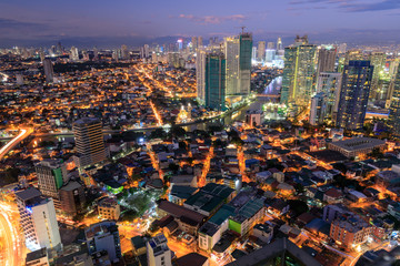Manila Skyline. Night view of Makati, the business district of Metro Manila - obrazy, fototapety, plakaty