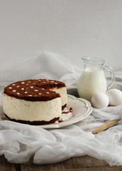 cake souffle with cream and chocolate cookie crumbs