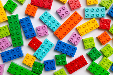 Plastic toy blocks on white background