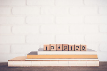 The word Inspire and copy space background.