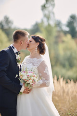 Happy bride and groom on their wedding day