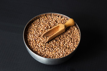 roasted buckwheat in metal bowl